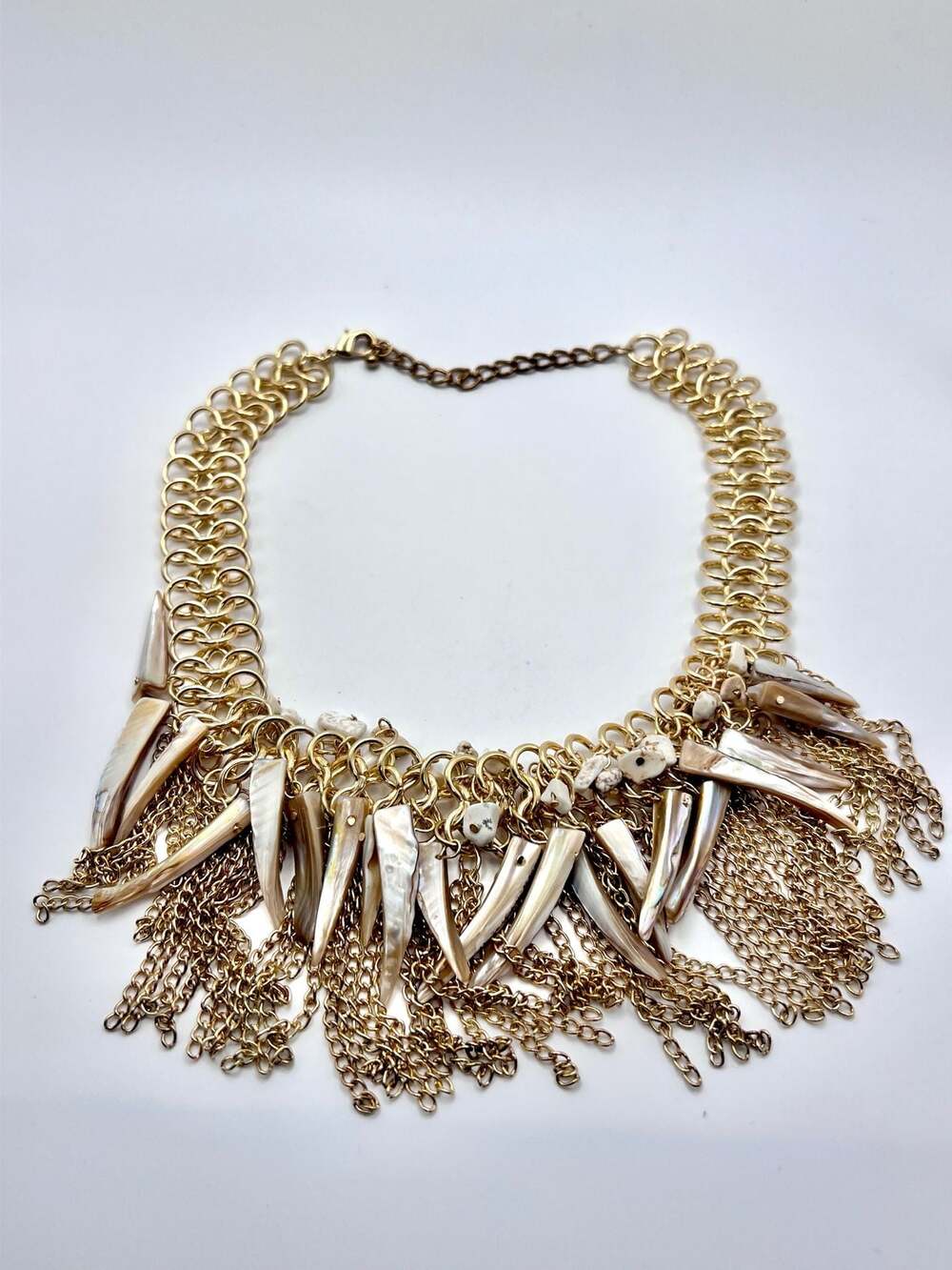Statement Gold Tone Chain Link Necklace with Mother of Pearl-like Tusk Charms